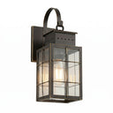 Norfield Sconce shown in the Bronze finish with a Clear shade - 9421P-H-BZ-CL 